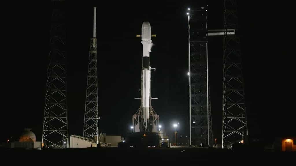 SpaceX Falcon 9 rocket launching 28 Starlink satellites to low Earth orbit from Cape Canaveral in October 2025 during record-setting 130th flight