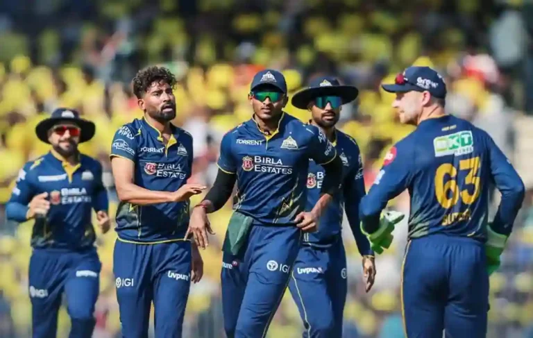 Gujarat Titans players standing together on the field during the CSK vs GT IPL 2026 match at Chepauk.