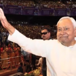 Bihar CM Nitish Kumar waving to supporters at NDA rally in Patna