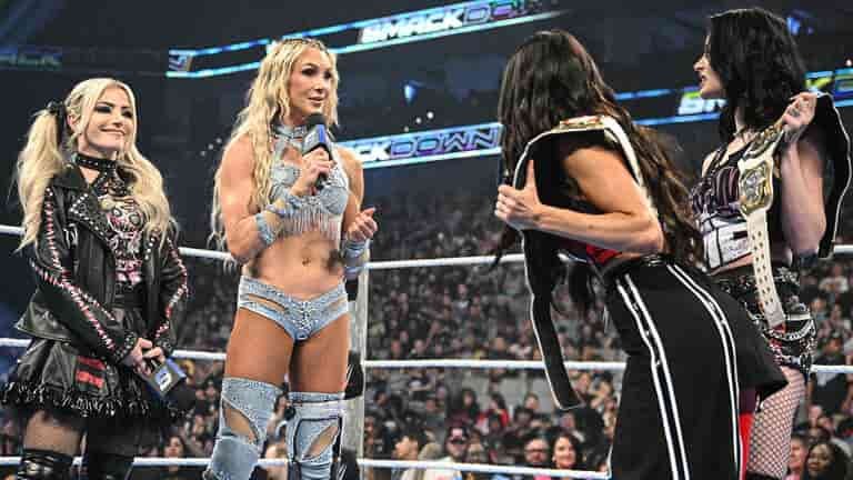 Women’s WWE Superstars standing in the ring during a SmackDown segment.