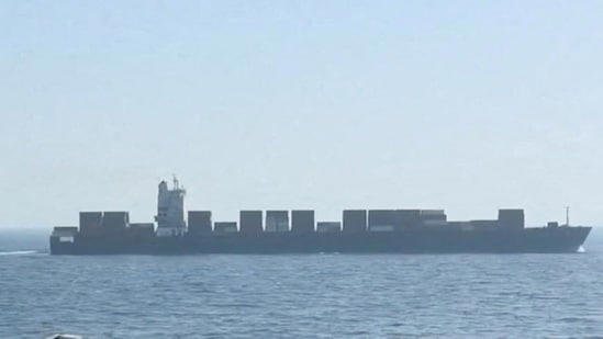 US Marines boarding Iranian cargo ship M/V Touska in Strait of Hormuz after engine disabled by gunfire.