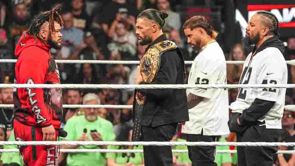 WWE stars face off inside the ring during a tense Raw segment.