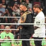 WWE stars face off inside the ring during a tense Raw segment.