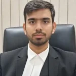 Delhi judicial officer Aman Kumar Sharma in formal attire.