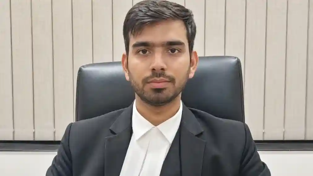 Delhi judicial officer Aman Kumar Sharma in formal attire.