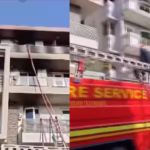 Firefighters respond to a deadly blaze at a residential building in Delhi’s Vivek Vihar.
