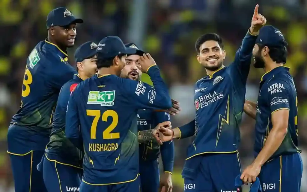 Gujarat Titans players celebrate during an IPL match.