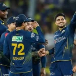 Gujarat Titans players celebrate during an IPL match.