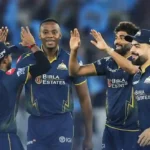 Gujarat Titans players celebrating a wicket during their IPL 2026 match.