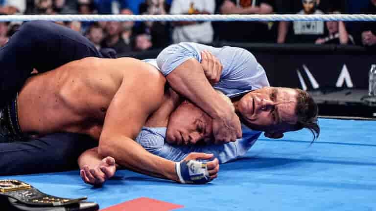 Gunther attacks Cody Rhodes after his victory over Sami Zayn.