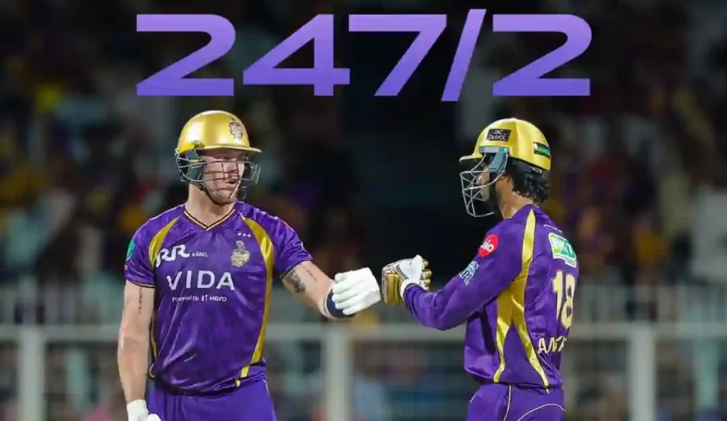 Two Kolkata Knight Riders players in purple and gold exchange a fist‑bump on the Eden Gardens field after a big partnership, with “247/2” displayed above.