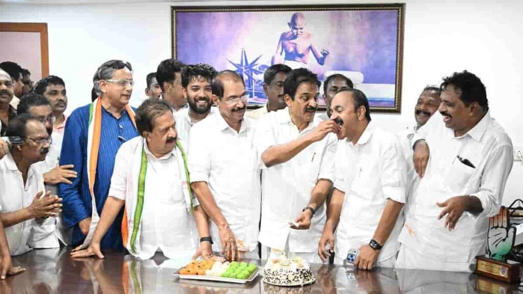 Congress-led UDF leaders celebrating their victory in the 2026 Kerala Assembly elections by sharing sweets.